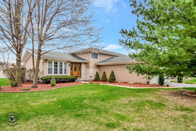 16529 Edgewood Dr, Plainfield, IL 60544 - split level home featuring a front yard and brick siding