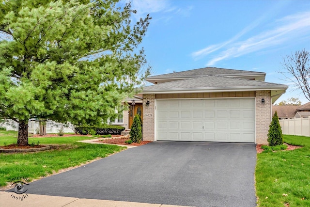 16529 Edgewood Dr, Plainfield, IL 60544 - view of front of house featuring brick siding, driveway, and a garage
