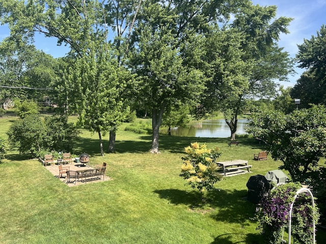 980 Hillcrest Blvd, Hoffman Estates, IL 60169 - view of green lawn with a water view, a patio, and view of scattered trees