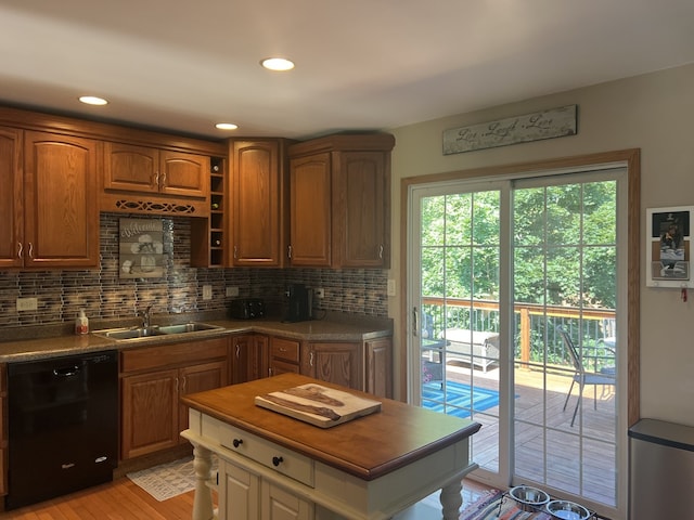 980 Hillcrest Blvd, Hoffman Estates, IL 60169 - kitchen with black dishwasher, backsplash, light wood finished floors, brown cabinets, and recessed lighting