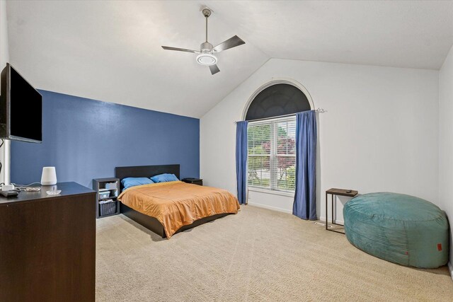 402 Wesley Ave, Savoy, IL 61874 - carpeted bedroom featuring vaulted ceiling and ceiling fan
