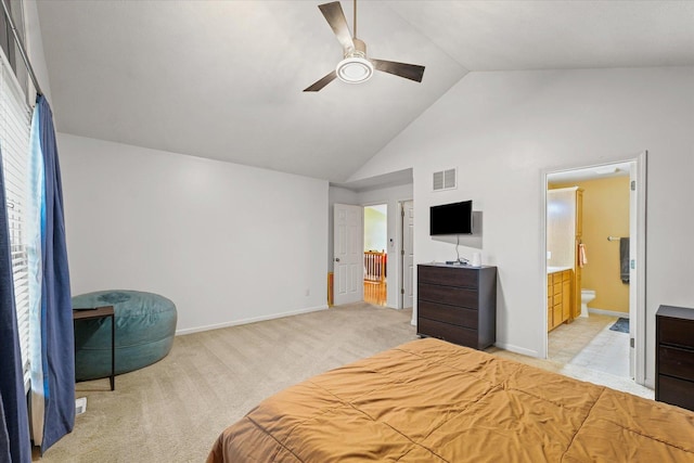 402 Wesley Ave, Savoy, IL 61874 - bedroom with high vaulted ceiling, light carpet, ensuite bath, and ceiling fan