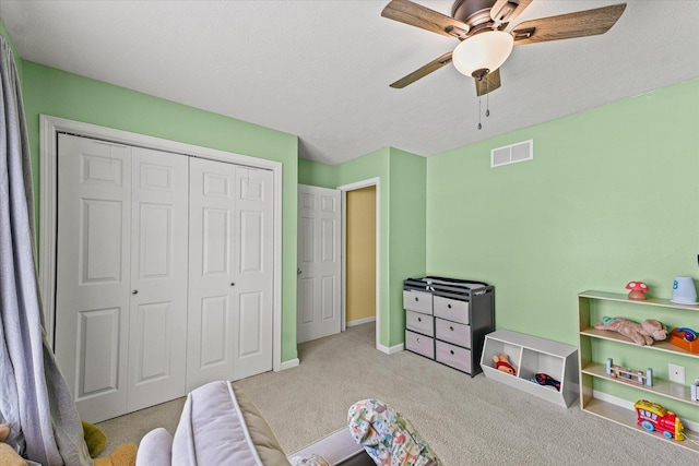 402 Wesley Ave, Savoy, IL 61874 - recreation room featuring carpet and ceiling fan
