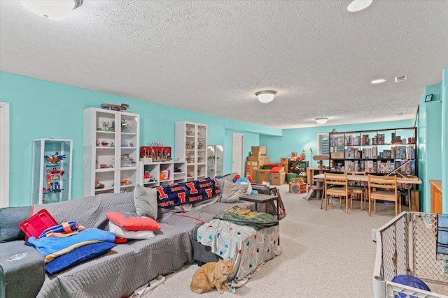 402 Wesley Ave, Savoy, IL 61874 - carpeted living room with a textured ceiling