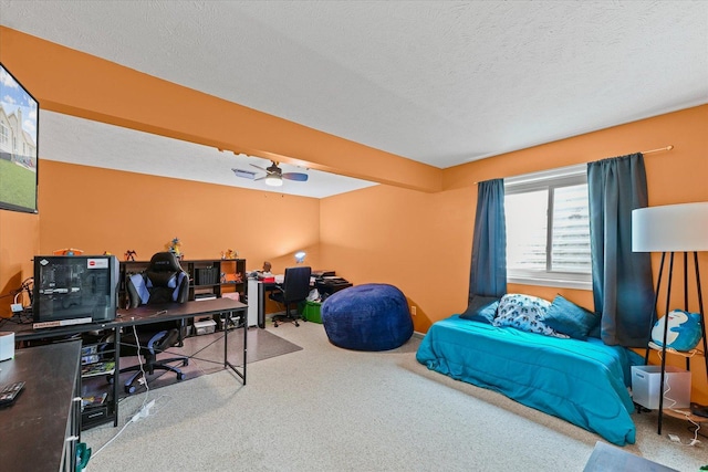402 Wesley Ave, Savoy, IL 61874 - bedroom featuring carpet flooring, a desk, ceiling fan, and a textured ceiling
