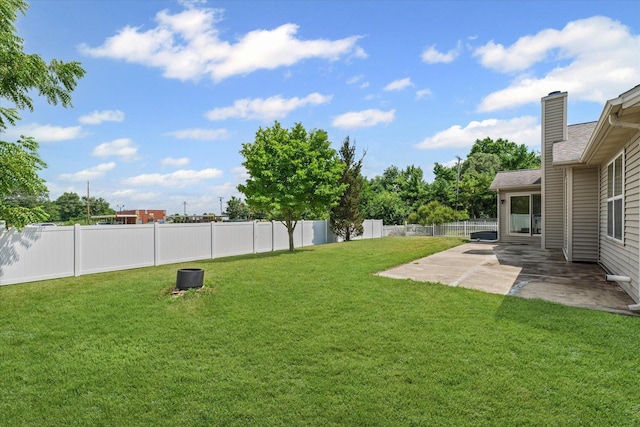 402 Wesley Ave, Savoy, IL 61874 - fenced backyard featuring a patio area