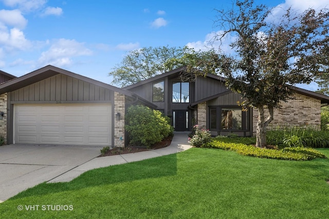 3118 River Falls Dr, Northbrook, IL 60062 - mid-century modern home with a garage, driveway, a front yard, and brick siding