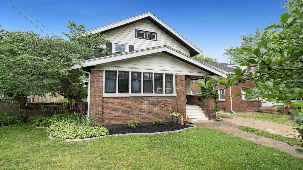 324 N Prospect St, Rockford, IL 61107 - view of front of home with brick siding