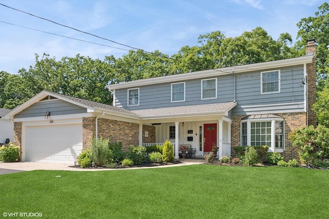 200 W Center Ave, Lake Bluff, IL 60044 - traditional-style home featuring brick siding, a porch, a front lawn, and an attached garage