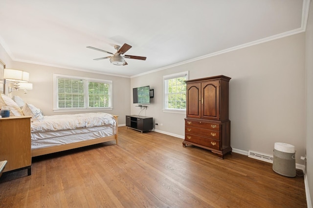 200 W Center Ave, Lake Bluff, IL 60044 - bedroom featuring ornamental molding, light wood finished floors, and a ceiling fan