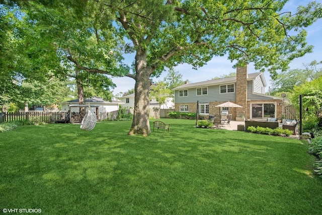 200 W Center Ave, Lake Bluff, IL 60044 - fenced backyard with an outdoor hangout area and a patio area