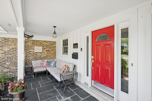 200 W Center Ave, Lake Bluff, IL 60044 - view of exterior entry featuring a porch and board and batten siding