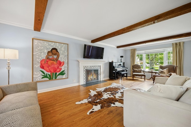 200 W Center Ave, Lake Bluff, IL 60044 - living room featuring beamed ceiling, a tile fireplace, and wood finished floors