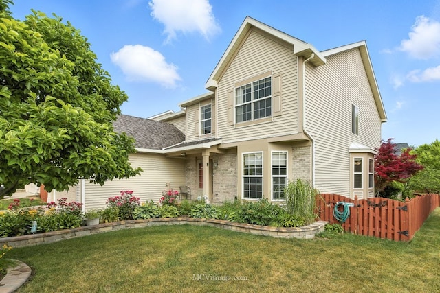 2943 Heather Ln, Montgomery, IL 60538 - traditional-style house with brick siding and a shingled roof