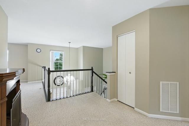 2943 Heather Ln, Montgomery, IL 60538 - hall featuring an upstairs landing and carpet flooring
