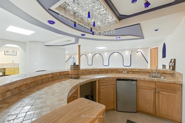 2943 Heather Ln, Montgomery, IL 60538 - kitchen with refrigerator and brown cabinetry