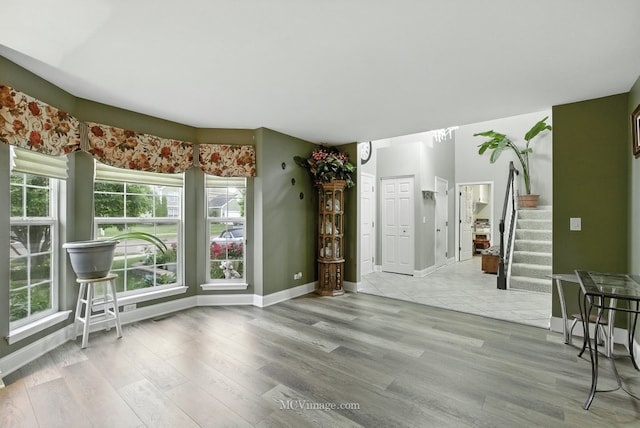 2943 Heather Ln, Montgomery, IL 60538 - dining space with wood finished floors, plenty of natural light, and stairs
