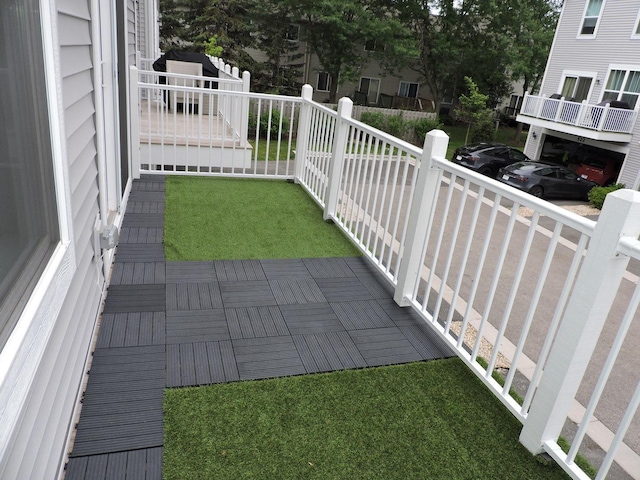 516 Wolverine Dr, Aurora, IL 60502 - view of grassy yard featuring a balcony