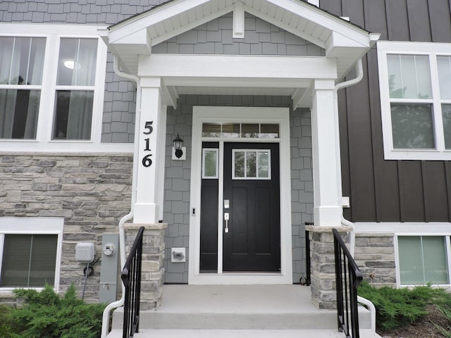 516 Wolverine Dr, Aurora, IL 60502 - property entrance featuring stone siding