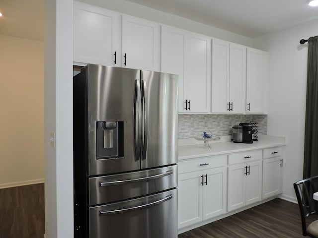 516 Wolverine Dr, Aurora, IL 60502 - kitchen featuring stainless steel fridge with ice dispenser, dark wood-style floors, light countertops, and white cabinets