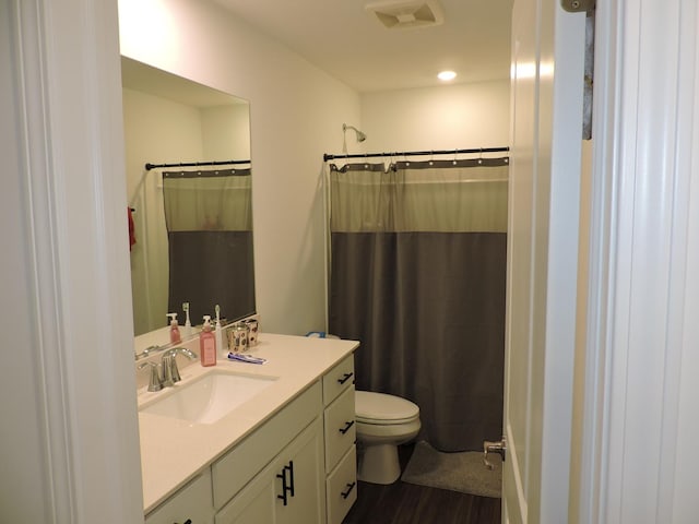 516 Wolverine Dr, Aurora, IL 60502 - full bathroom featuring vanity, wood finished floors, and a shower with shower curtain