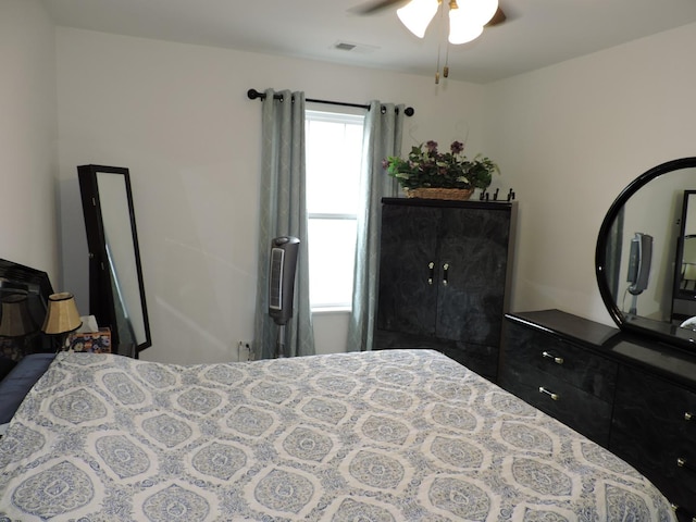 516 Wolverine Dr, Aurora, IL 60502 - bedroom featuring a ceiling fan