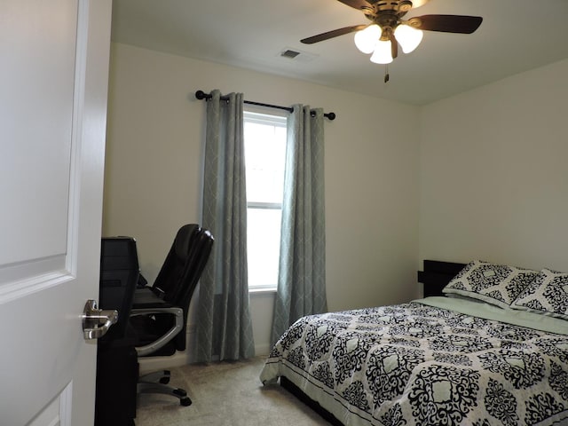 516 Wolverine Dr, Aurora, IL 60502 - bedroom featuring light carpet and a ceiling fan