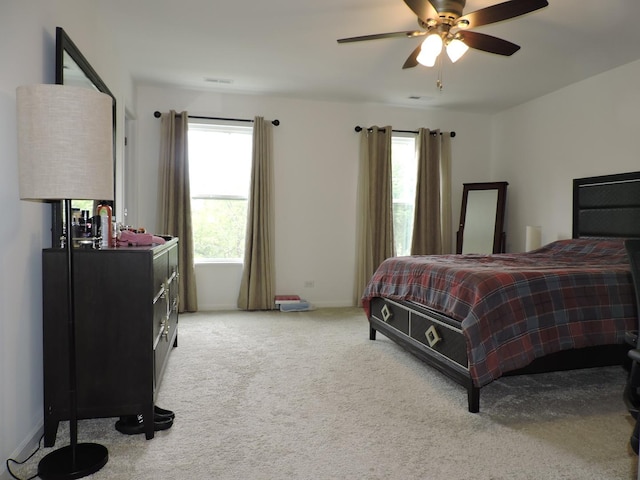 516 Wolverine Dr, Aurora, IL 60502 - bedroom featuring light carpet and ceiling fan