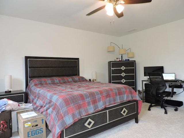 516 Wolverine Dr, Aurora, IL 60502 - carpeted bedroom with an office area and a ceiling fan