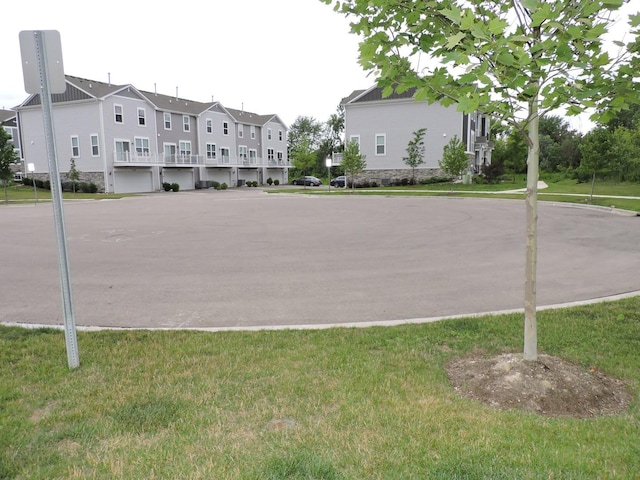516 Wolverine Dr, Aurora, IL 60502 - view of property's community with a lawn and a residential view