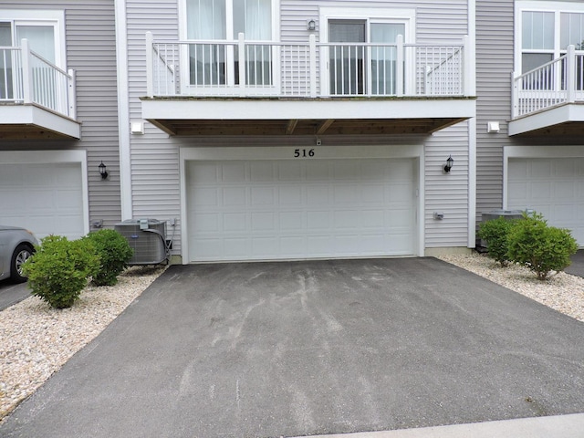 516 Wolverine Dr, Aurora, IL 60502 - garage featuring driveway