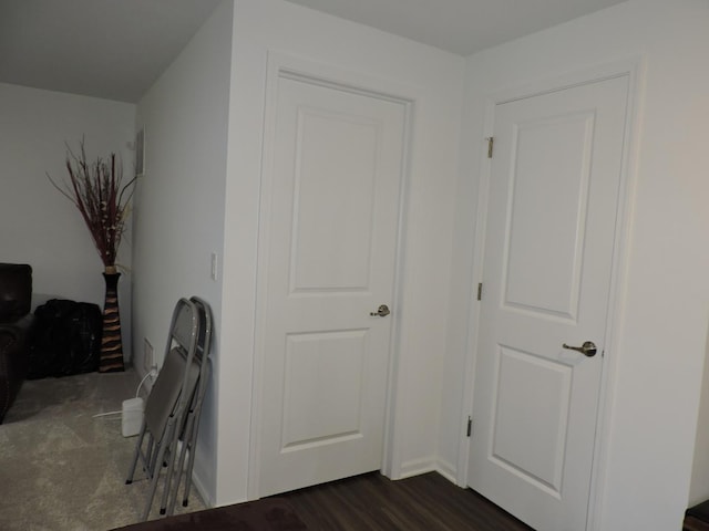 516 Wolverine Dr, Aurora, IL 60502 - bonus room featuring dark wood-style flooring and baseboards