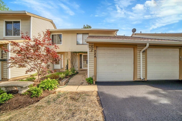 724 Colorado Ct Unit 724, Carol Stream, IL 60188 - multi unit property featuring an attached garage and asphalt driveway
