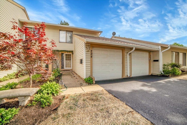 724 Colorado Ct Unit 724, Carol Stream, IL 60188 - view of property with a garage and asphalt driveway