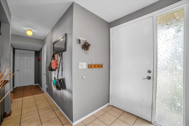 724 Colorado Ct Unit 724, Carol Stream, IL 60188 - foyer entrance featuring light tile patterned floors and baseboards