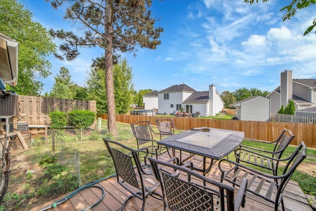 724 Colorado Ct Unit 724, Carol Stream, IL 60188 - deck with outdoor dining area and a fenced backyard