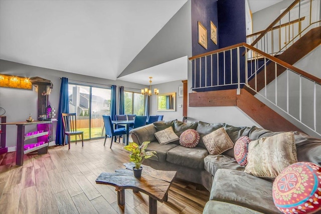 724 Colorado Ct Unit 724, Carol Stream, IL 60188 - living room featuring a chandelier, stairs, wood finished floors, and vaulted ceiling