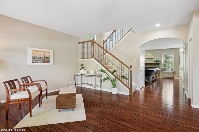 2865 Trail Crest Ln, Lindenhurst, IL 60046 - living area featuring arched walkways, hardwood / wood-style floors, stairs, and recessed lighting