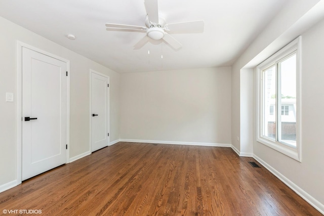 19 Cour Saint Tropez Ct Unit 19, Palos Hills, IL 60465 - spare room featuring healthy amount of natural light, wood finished floors, a smoke detector, and ceiling fan