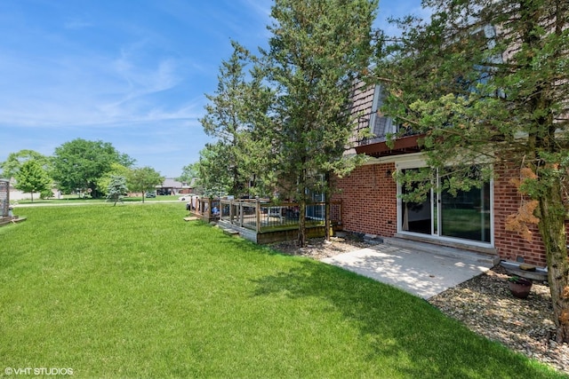 19 Cour Saint Tropez Ct Unit 19, Palos Hills, IL 60465 - view of green lawn featuring a deck and a patio