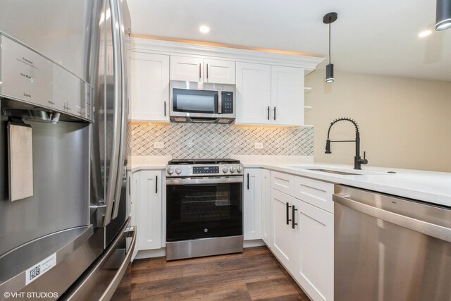 19 Cour Saint Tropez Ct Unit 19, Palos Hills, IL 60465 - kitchen featuring stainless steel appliances, open shelves, decorative backsplash, light countertops, and white cabinets