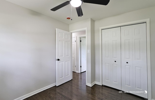 5505 Oak Park Rd, Cary, IL 60013 - unfurnished bedroom with dark wood-style flooring, a closet, and a ceiling fan