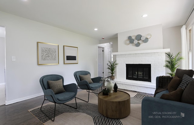5505 Oak Park Rd, Cary, IL 60013 - living room with wood finished floors, recessed lighting, and a fireplace