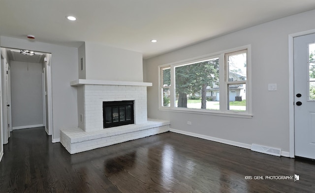 5505 Oak Park Rd, Cary, IL 60013 - unfurnished living room featuring wood finished floors, a fireplace, and recessed lighting