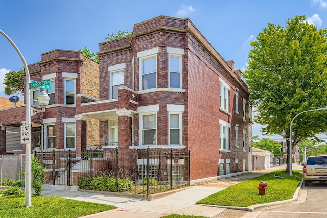 5359 S Marshfield Ave, Chicago, IL 60609 - multi unit property with brick siding and a fenced front yard