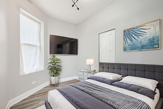 5359 S Marshfield Ave, Chicago, IL 60609 - bedroom with light wood-type flooring and baseboards