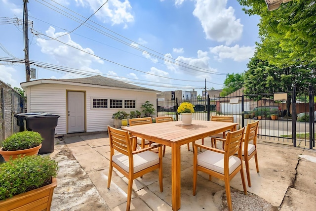 5359 S Marshfield Ave, Chicago, IL 60609 - view of patio / terrace with outdoor dining space and an outbuilding
