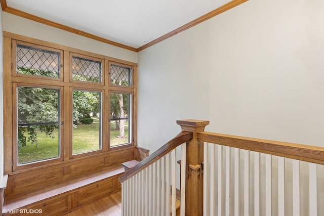 710 W Downer Pl, Aurora, IL 60506 - stairway featuring plenty of natural light and crown molding