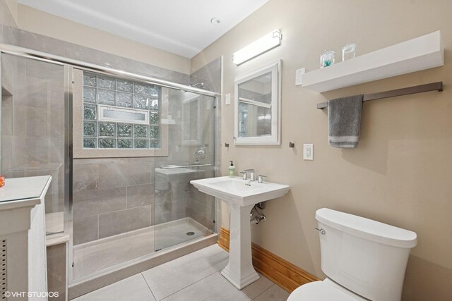 710 W Downer Pl, Aurora, IL 60506 - bathroom with tile patterned floors and a stall shower