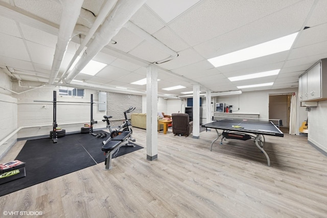 710 W Downer Pl, Aurora, IL 60506 - workout area featuring wood finished floors and a drop ceiling